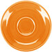 A Tangerine saucer with a circular ring in the middle.