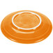 A Tangerine Fiesta saucer with a white rim.
