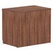 An Alera Valencia modern walnut office storage cabinet with a door.