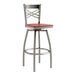 A red and silver Lancaster Table & Seating swivel bar stool with a mahogany wood seat.