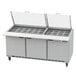 A Beverage-Air stainless steel 3 door refrigerated sandwich prep table.