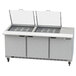 A Beverage-Air stainless steel sandwich prep table with 3 doors open on a counter.