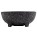 A close-up of a black HS Inc. Polypropylene Pequeno Molcajete with a grey base.