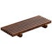 A Playground Ananti walnut wood rectangular crumb grid with slats.