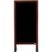 A black board with a wooden frame.