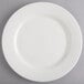 A Homer Laughlin Kensington Ameriwhite white china plate with a white rim.