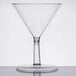 A clear plastic martini glass with a stem.