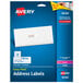 A blue box of white Avery address labels with a black rectangle on the front.