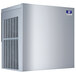 A white Manitowoc air cooled ice machine with a blue air filter.