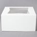 A white box with a clear window.