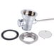 A T&S stainless steel twist waste valve with a metal ring and round metal drain.