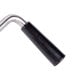 A close-up of a metal T&S twist waste valve handle with black and silver accents.