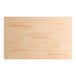A close up of a Lancaster Table & Seating solid wood table top with a bleached oak finish.