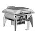 An Acopa stainless steel chafer with a glass lid on a table with a stand.