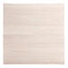 A white square wood surface with a live edge and wood grain.