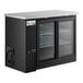 An Avantco black counter height back bar refrigerator with glass sliding doors.
