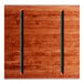 A Lancaster Table & Seating live edge wood table top with a rustic mahogany finish and black metal bars.