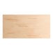 A close up of a Lancaster Table & Seating solid wood table top with a bleached oak finish.