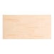 A rectangular solid wood table top with a bleached oak finish and a live edge design.