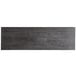 A rectangular black wooden Lancaster Table & Seating live edge table top with a gray finish.