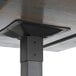 A metal base supporting a Lancaster Table & Seating bar height table.