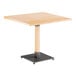 A Lancaster Table & Seating square table with a metal base and wooden top.