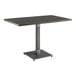 A Lancaster Table & Seating rectangular table with a metal base.
