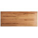 A rectangular wood surface with a live edge and an antique natural finish.