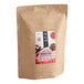 A brown bag of Numi Organic Rooibos Chai Loose Leaf Tea with a label.