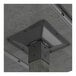A metal industrial table base with a slate gray finish attached to a flat surface.