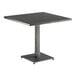 A Lancaster Table & Seating industrial square table with a slate gray top and metal base.