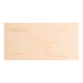 A rectangular solid wood bar height table top with a bleached oak finish and a live edge design.