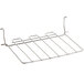 An Avantco loading tray with four wire shelves on it.