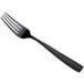 a black fork with a long handle