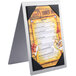 a menu on a stand