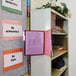 a file folder and books on shelves