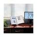 A Durable desktop reference system on a desk with a computer and a book open in it.