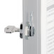 A Durable brushed aluminum key cabinet with a lock and key.