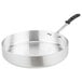 A Vollrath Wear-Ever aluminum saute pan with a TriVent silicone handle.