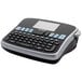 A black and grey DYMO LabelManager 360D label maker with a keyboard.