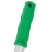 A green Unger medium duty floor scraper with a green and white handle and a silver tip.