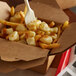 A box of Ellsworth Cooperative Creamery Natural White Cheddar Cheese Curds on a table.