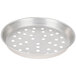 A silver round metal pan with holes.