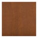 A close-up of the wood surface of a Lancaster Table and Seating dining table.
