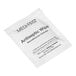 A white Medi-First packet with black text for antiseptic wipes.