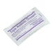 A close-up of a Medi-First antibiotic cream packet with purple text.