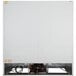 A white Beverage-Air MarketMax refrigerated merchandiser with black wires.