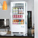 The side panel glass for an Avantco GSM3 series refrigerator with drinks in it.