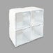 Three white plastic Deflecto tilt-bin organizers.