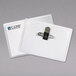 A C-Line clear name badge holder with a clip on a white paper card.